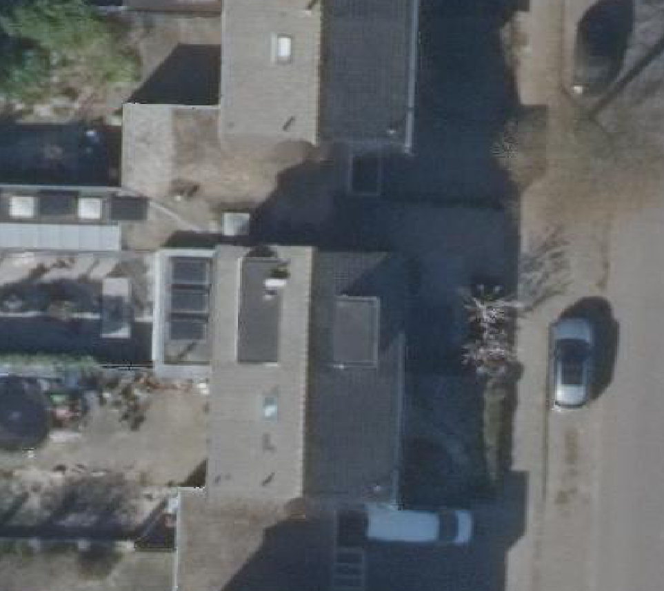 True ortho luchtfoto van Warmenhuizen met zicht op woning
