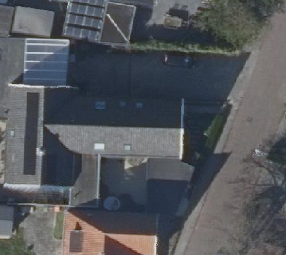 True ortho luchtfoto van Warmenhuizen met zicht op woning