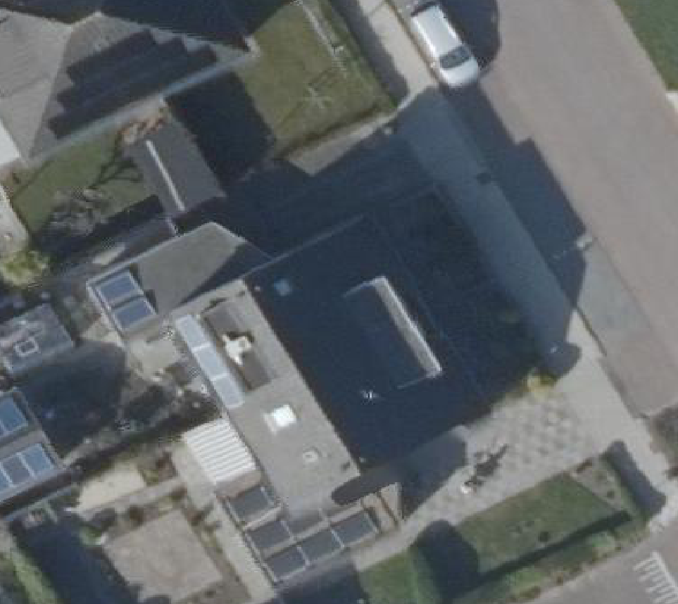 True ortho luchtfoto van 'T Veld met zicht op woning