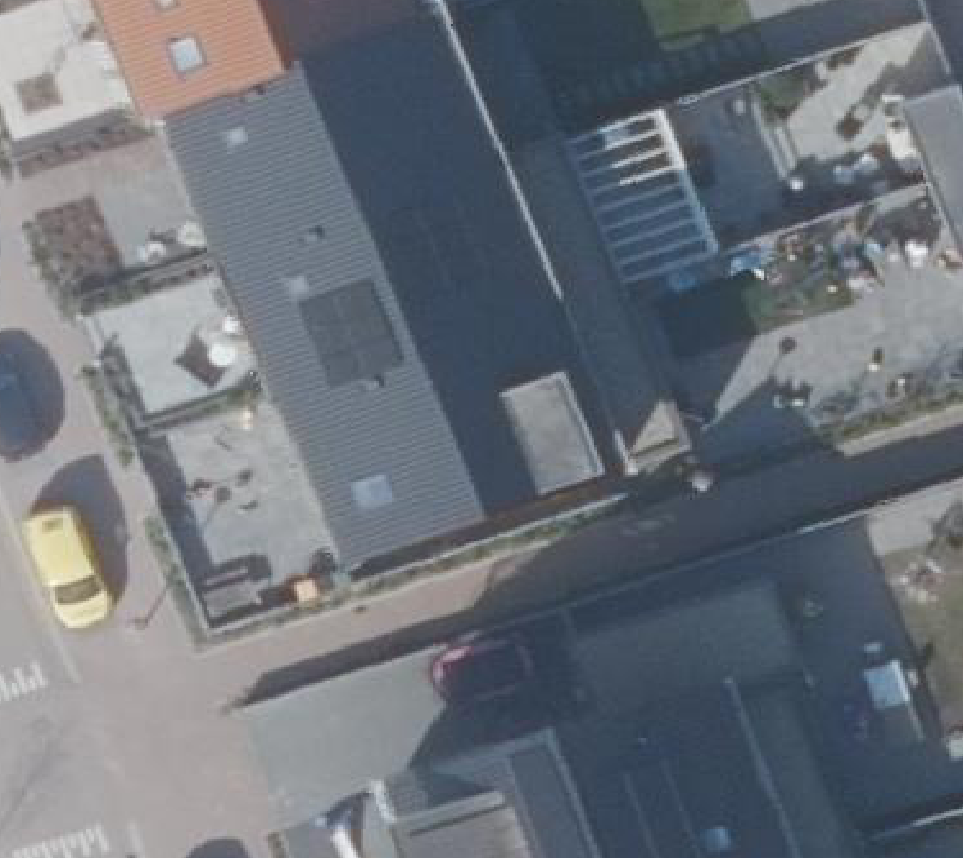 True ortho luchtfoto van Zuid-Scharwoude met zicht op woning