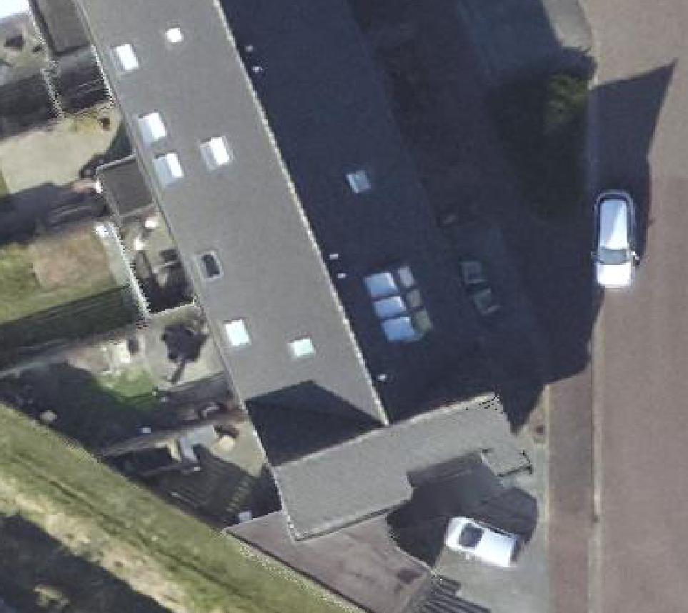 True ortho luchtfoto van Middenmeer met zicht op woning