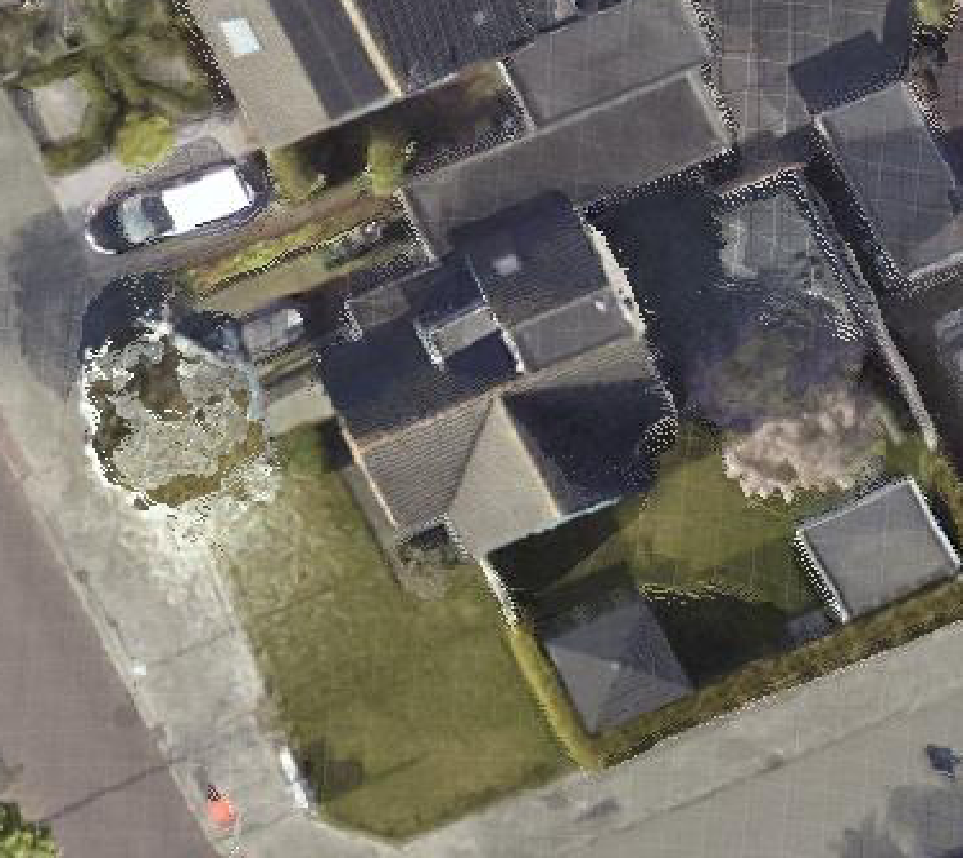 True ortho luchtfoto van Hoogezand met zicht op woning