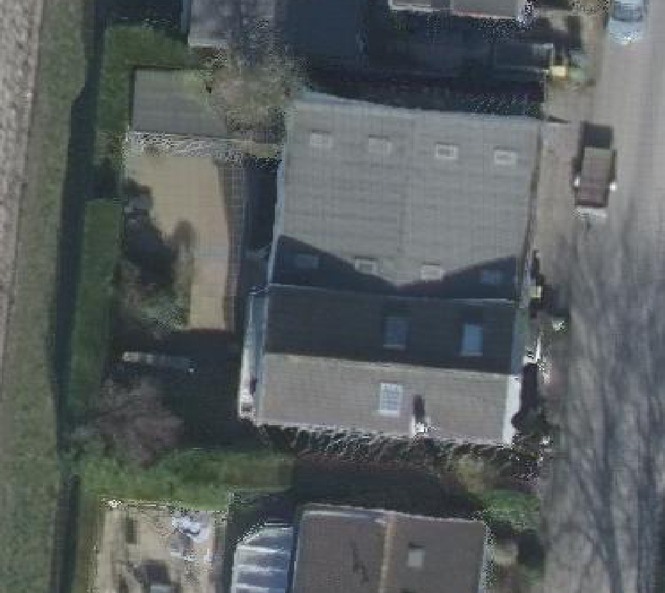 True ortho luchtfoto van Heinenoord met zicht op woning
