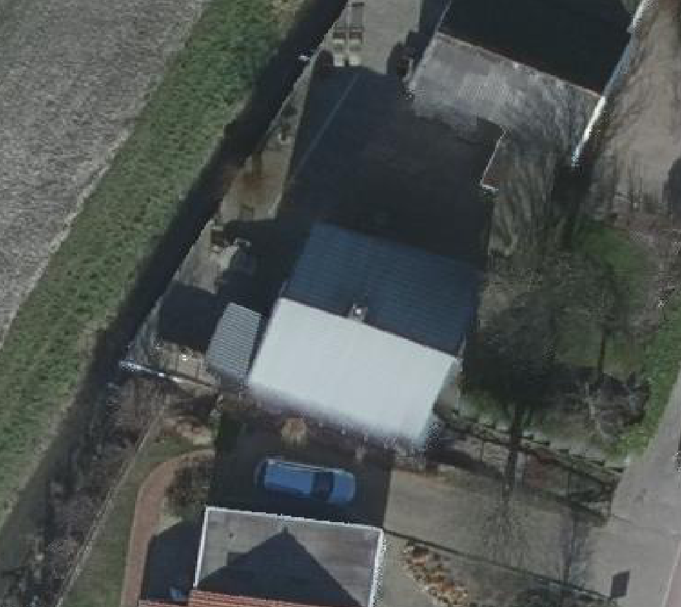 True ortho luchtfoto van Westmaas met zicht op woning