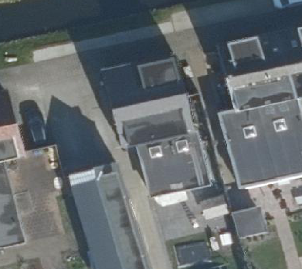 True ortho luchtfoto van Woubrugge met zicht op woning