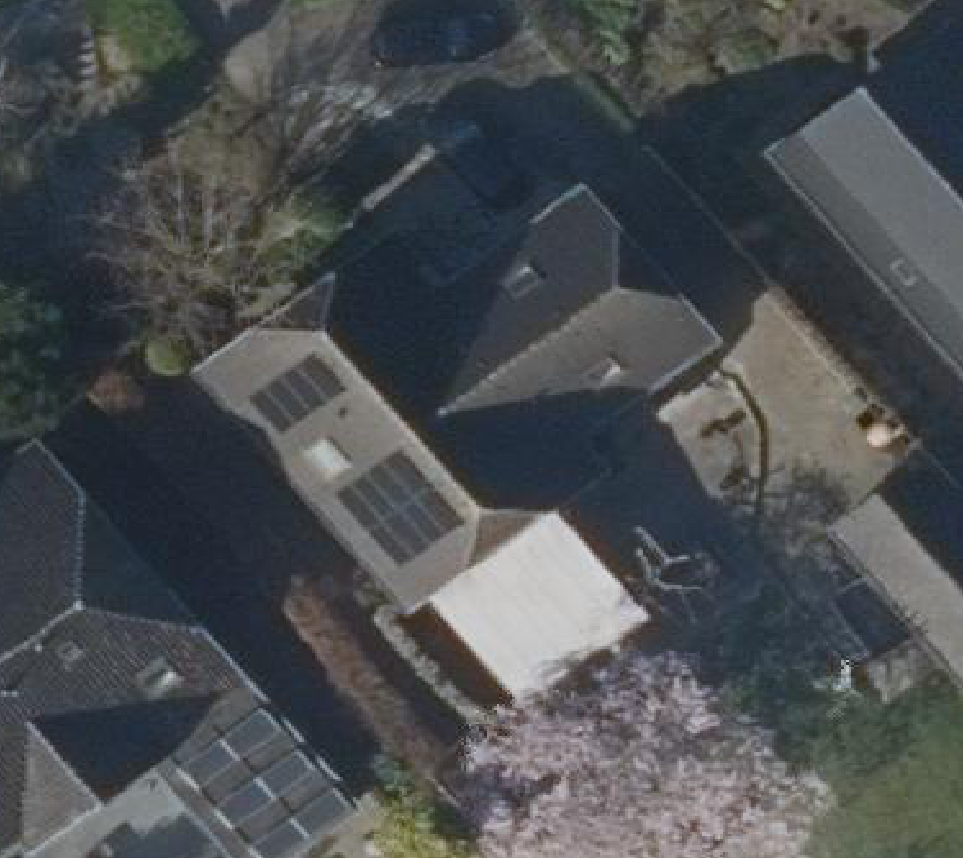 True ortho luchtfoto van 'T Veld met zicht op woning