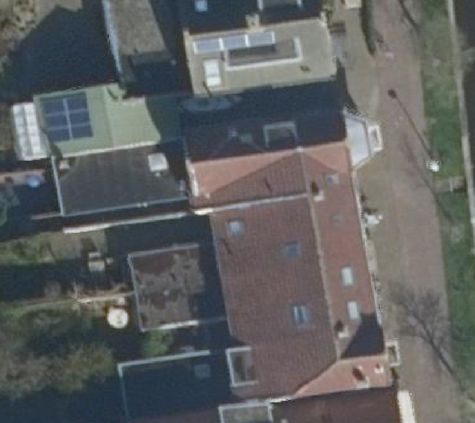 True ortho luchtfoto van Woubrugge met zicht op woning