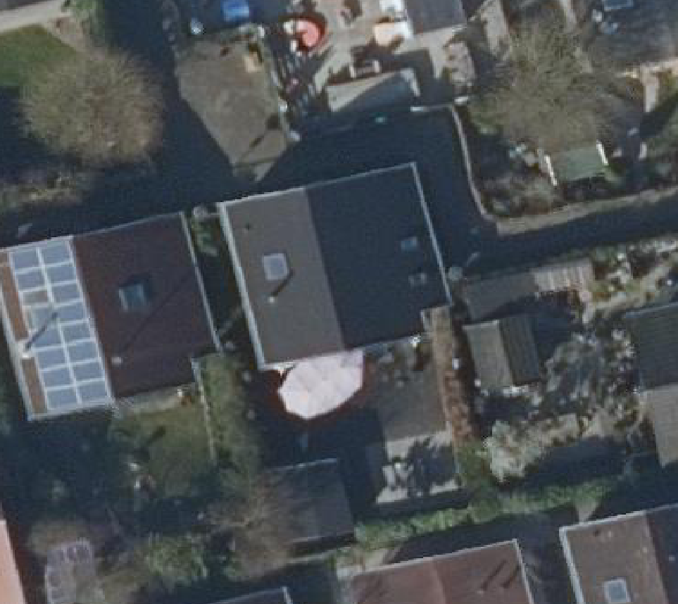 True ortho luchtfoto van Warmenhuizen met zicht op woning