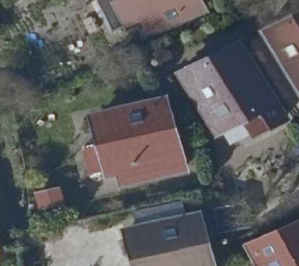 True ortho luchtfoto van Warmenhuizen met zicht op woning