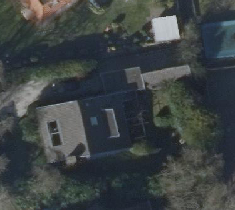 True ortho luchtfoto van Groet met zicht op woning