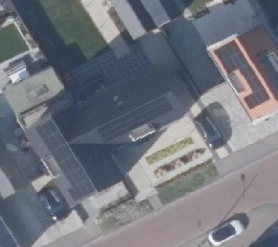 True ortho luchtfoto van Assendelft met zicht op woning