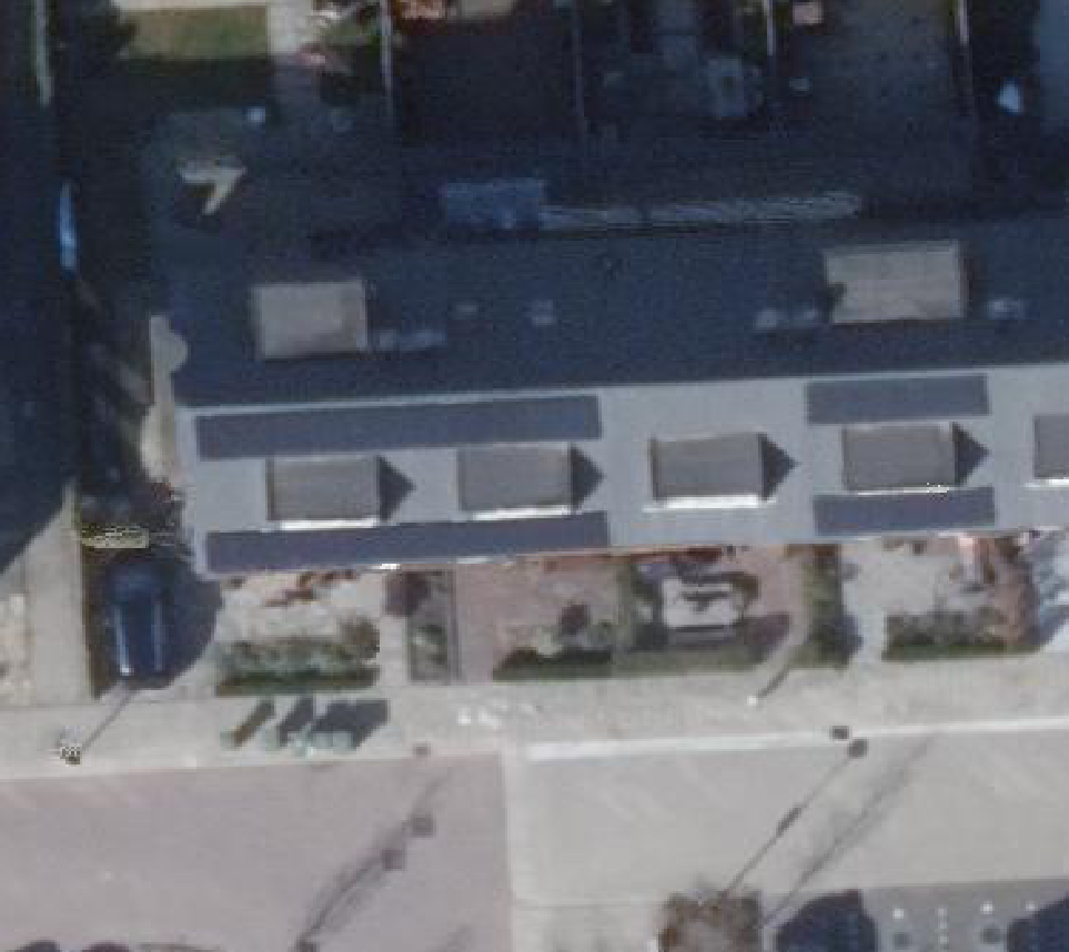 True ortho luchtfoto van Wormer met zicht op woning