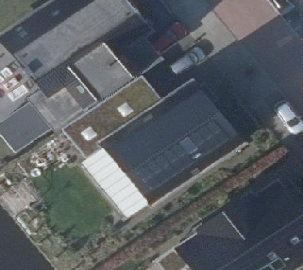 True ortho luchtfoto van Assendelft met zicht op woning