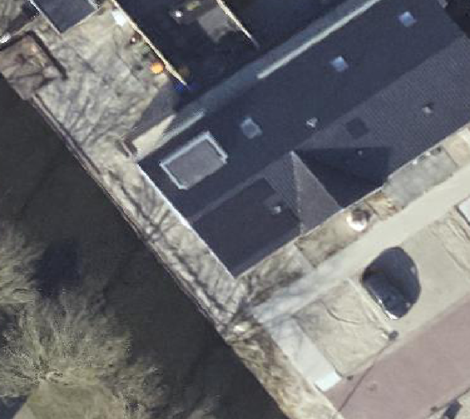 True ortho luchtfoto van 'T Zand met zicht op woning