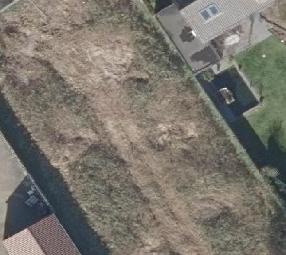 True ortho luchtfoto van Bakel met zicht op woning