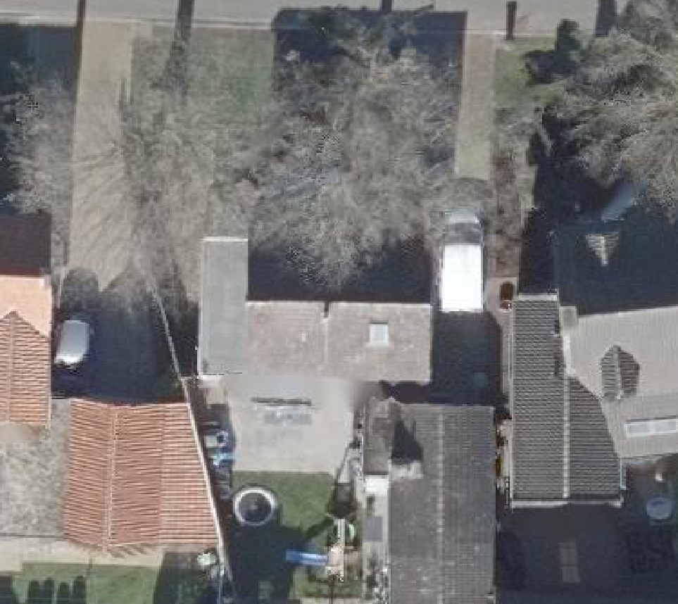 True ortho luchtfoto van Bakel met zicht op woning