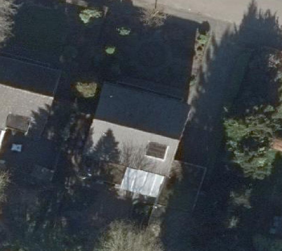 True ortho luchtfoto van Bakel met zicht op woning