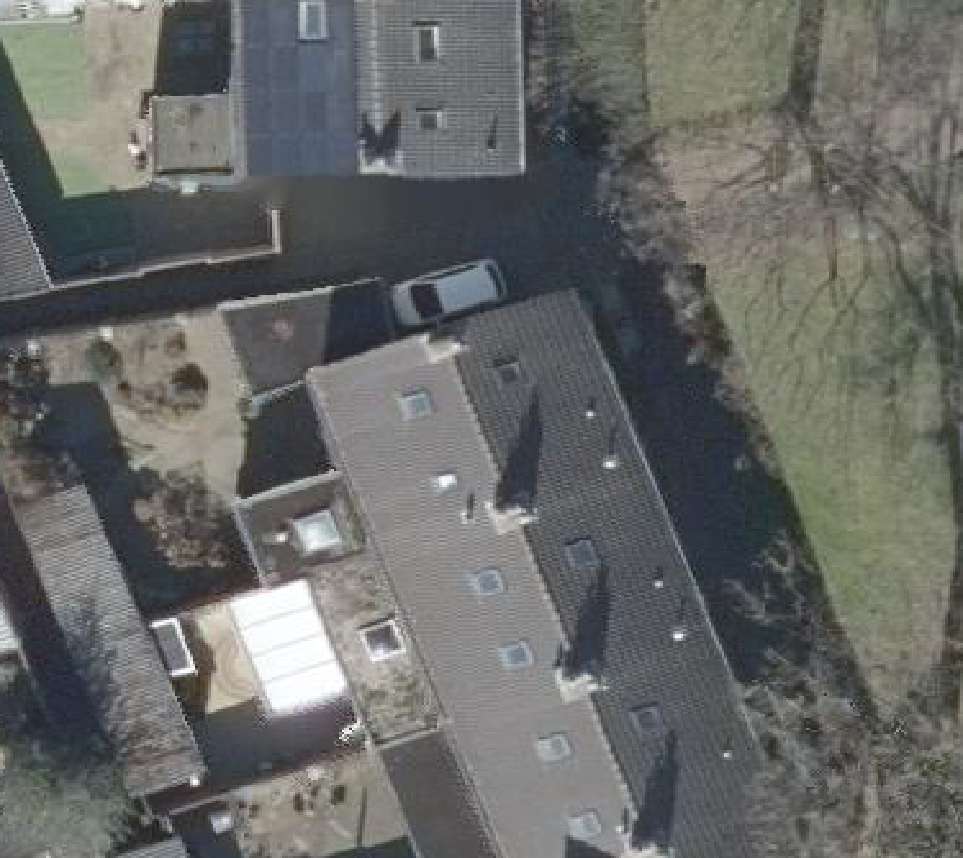 True ortho luchtfoto van Bakel met zicht op woning
