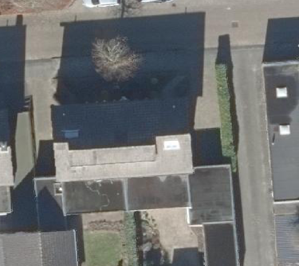 True ortho luchtfoto van Bakel met zicht op woning