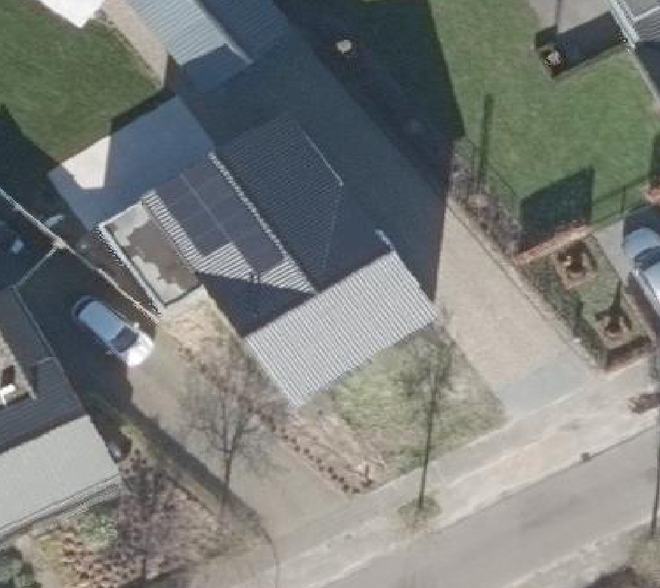 True ortho luchtfoto van Bakel met zicht op woning