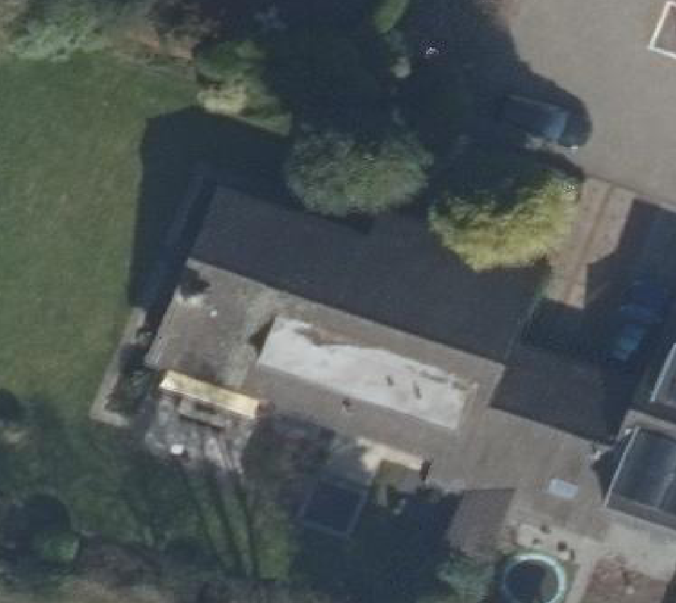 True ortho luchtfoto van Hoogland met zicht op woning