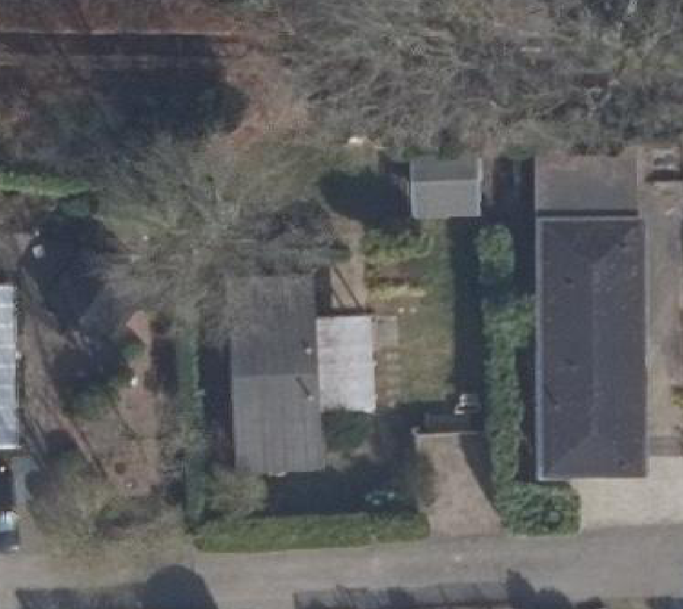 True ortho luchtfoto van Putten met zicht op woning
