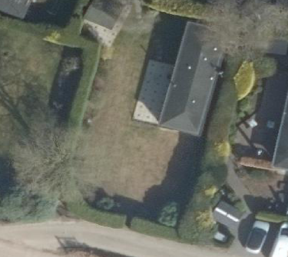 True ortho luchtfoto van Putten met zicht op woning