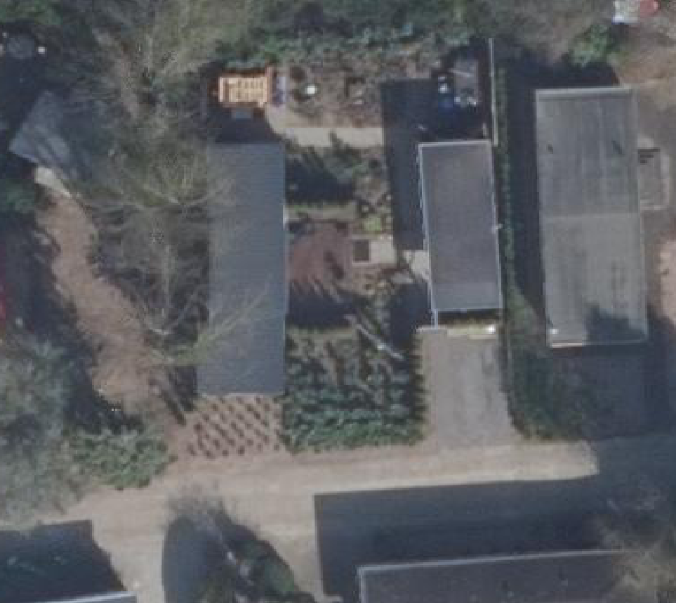 True ortho luchtfoto van Putten met zicht op woning