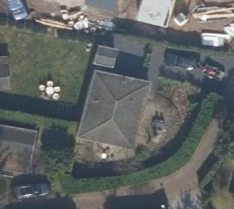 True ortho luchtfoto van Putten met zicht op woning