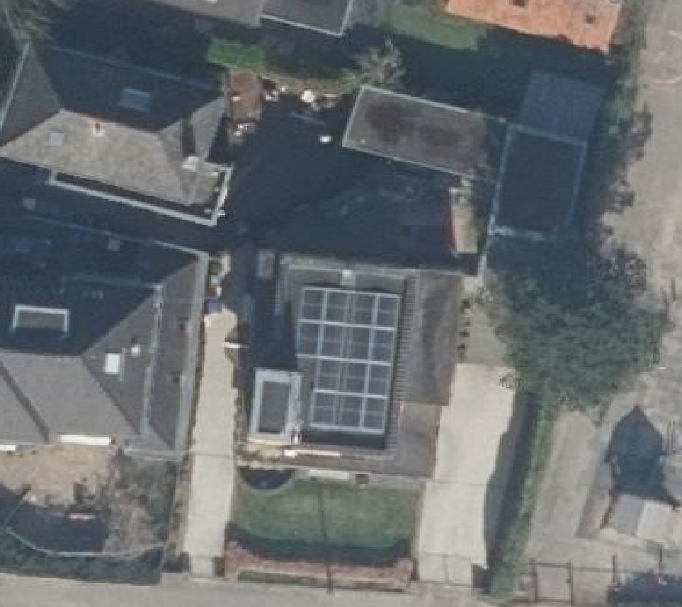 True ortho luchtfoto van Baarn met zicht op woning