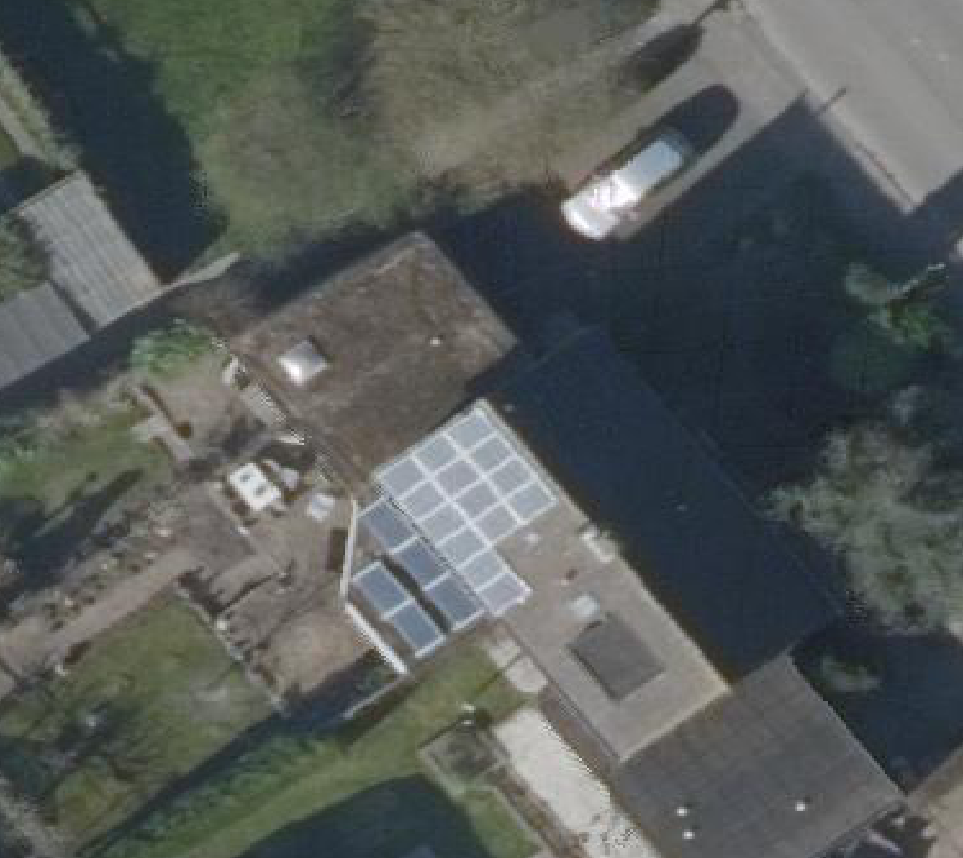 True ortho luchtfoto van 'T Veld met zicht op woning